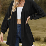 Women's stylish textured cardigan with lantern sleeves