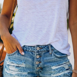 Women's high-waisted distressed denim shorts with tassels