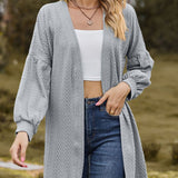Women's stylish textured cardigan with lantern sleeves