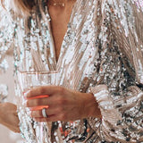 Women's blouse with sequins, v-neck, and balloon sleeves