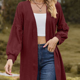 Women's stylish textured cardigan with lantern sleeves