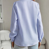 Women's elegant striped blouse with long sleeves