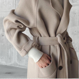 Women's oversized women's coat with belt and narrow collar